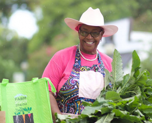 Cindy Ayers selling at a Farmers Market Cindy Ayers selling at a Farmers Market