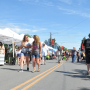 People walk through Helena, Montana's farmers market.