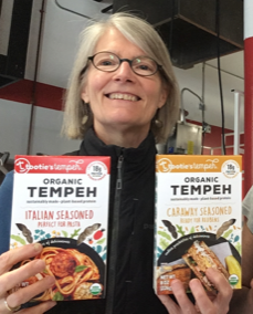 Sarah Speare holds packages of Tootie's Tempeh